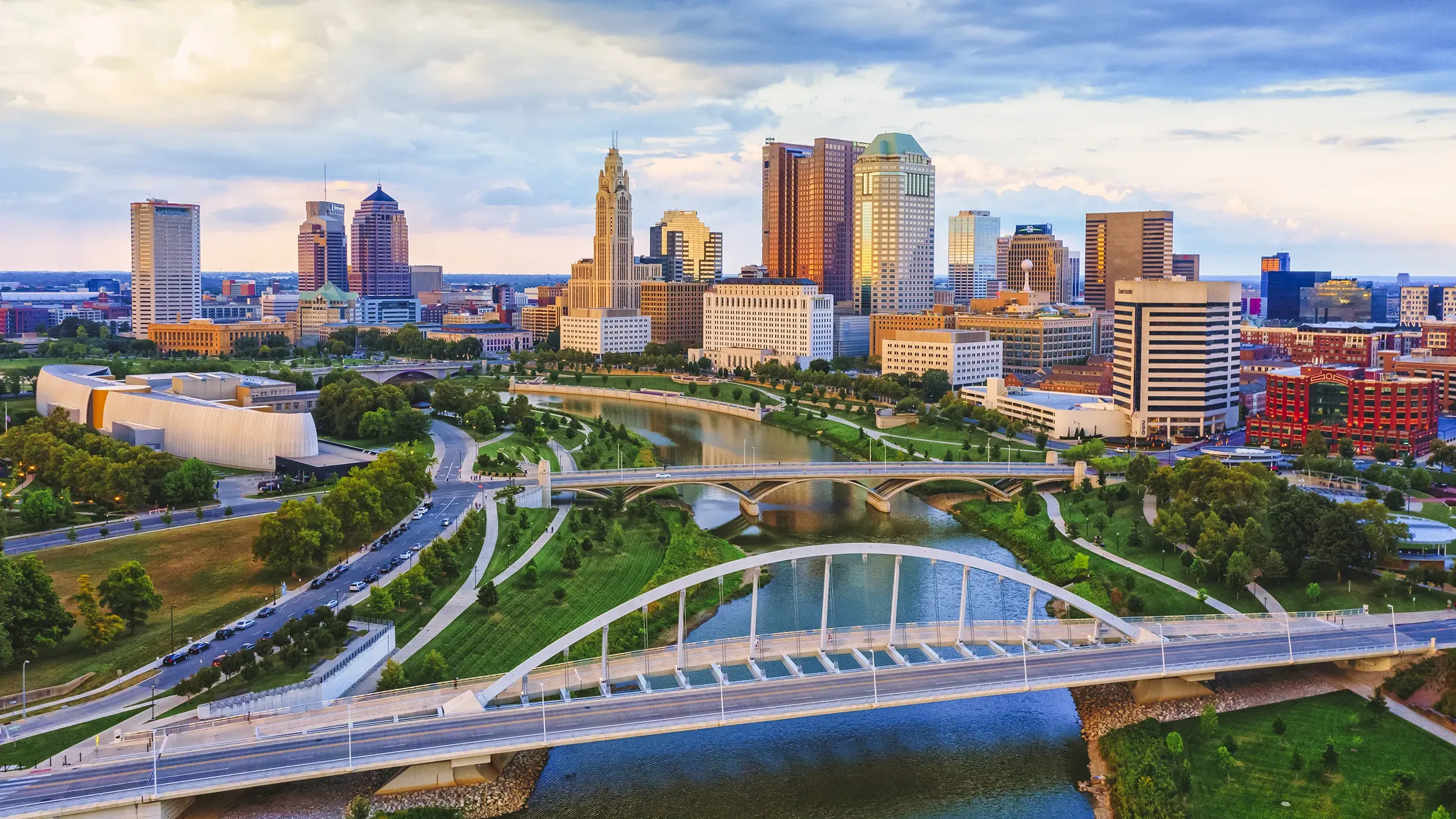Downtown skyline with river and arched bridges